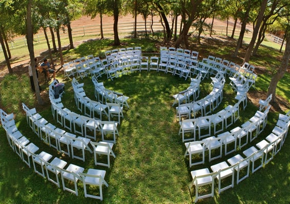 Ceremony under the trees.