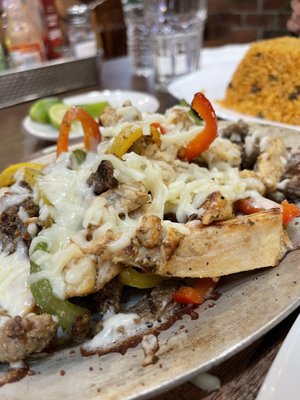 Beef and Chicken Fajitas with melted cheese