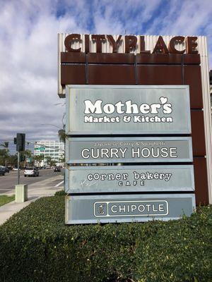 Rustic signage of some of the stores at the City Place