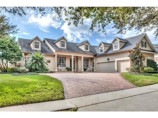 Custom-built home ideally located in the highly desirable gated neighborhood of Westover Reserve in Windermere!