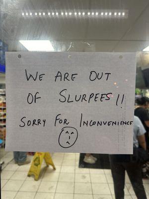 The sign on the door says "out of slurpeez"