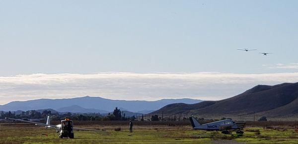 PW-6 after landing. Krosno on aero tow in background