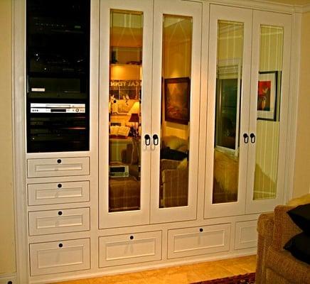 His, built in custom closet features integrated hi fi system, beveled mirror doors, aromatic Cedar lining throughout, tie rac...