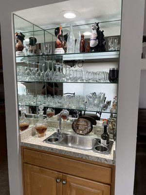 New mirror with glass stacked shelves