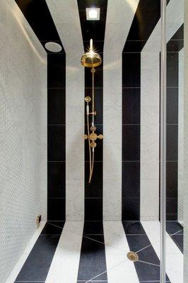 Custom gold shower fixture installation