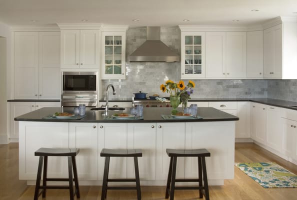 White painted kitchen designed by north shore kitchen showroom Heartwood Kitchens.