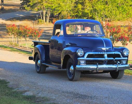 "55 Chevy -available for entrances, exits, photo ops.