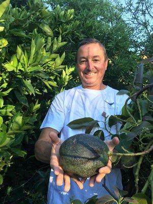 Paul with a home grown avocado!