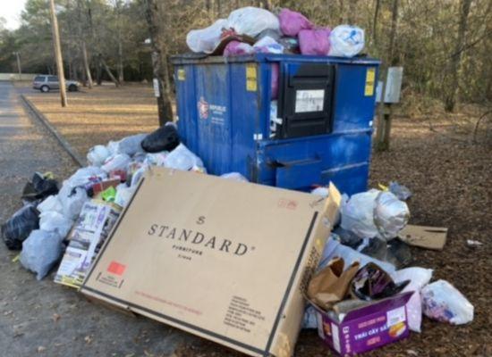 Trash overflowing after property refusing to pay trash bills on time