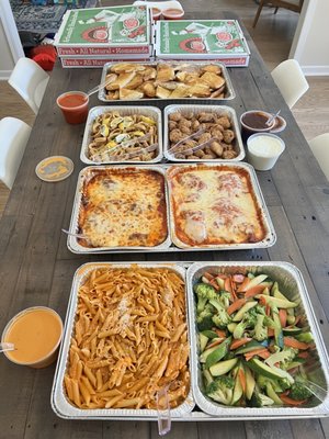 Pizza, garlic bread, calamari, boneless wings, eggplant parm, chicken parm, penne vodka and sautéed mixed vegetables!