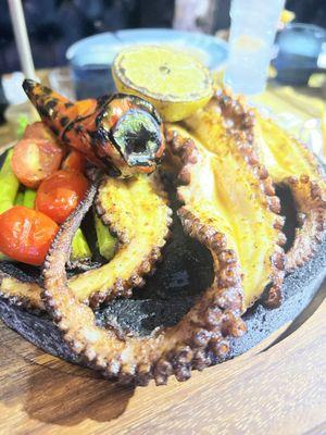 Grill octopus, cherry tomatos, asparagus