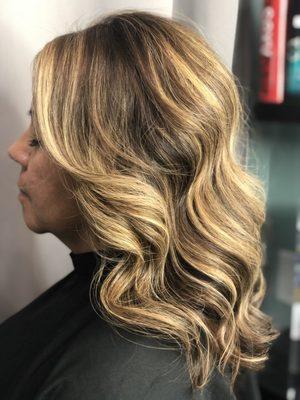 Full highlights with root touch up, cut & style.