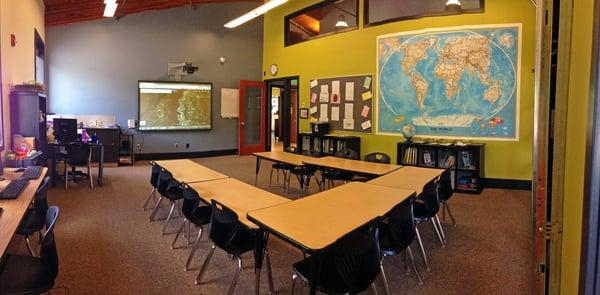 A classroom complete with ergonomic chairs and a smart board!