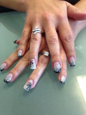 Acrylic nails done by Tiffany