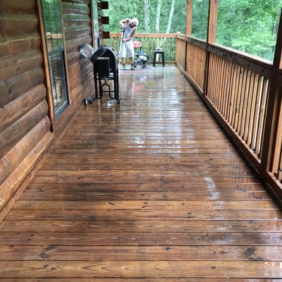 Pressure washing log home