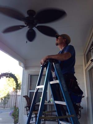 Larry installing our fan.