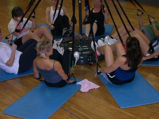 Pilates floor exercise w/ the Corepole