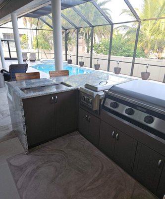 The sink is on the left with a hidden and retractable faucet