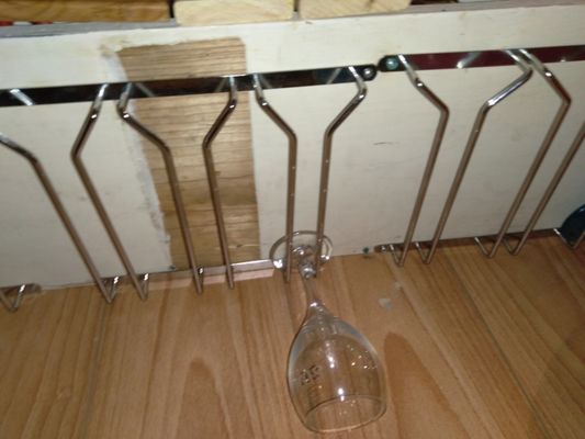 Floating Wine rack installed underneath a cabinet