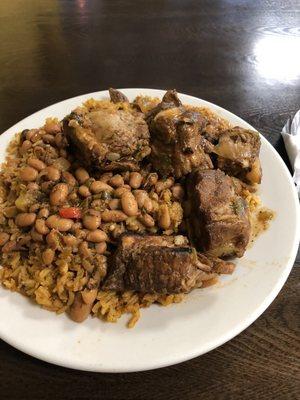 Chevo con arroz y gandules