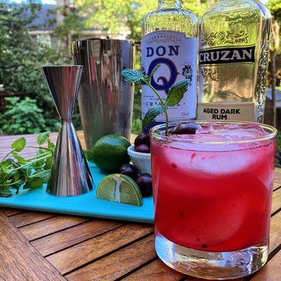 Cherry mojitos at a casual summer party. Fresh ingredients make all the difference!