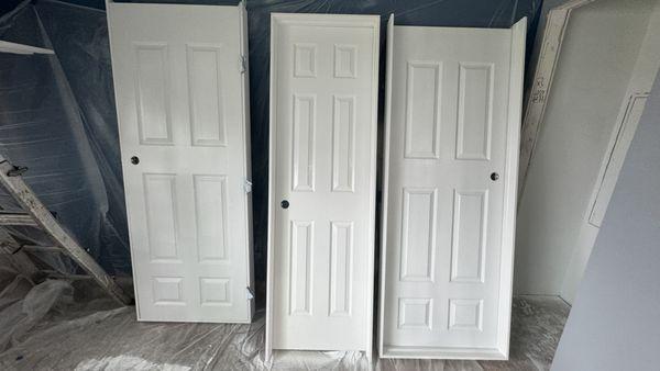 Brand new doors prepped and painted ready to be installed.