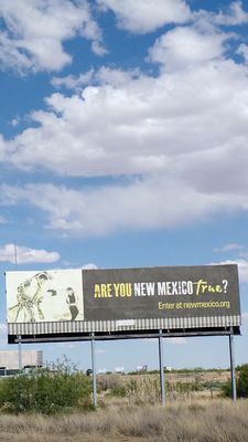 Billboard that also includes Las Cruces.