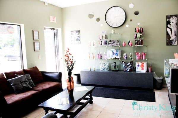 The waiting area is relaxing with couches and hot or cold beverages while you are waiting.