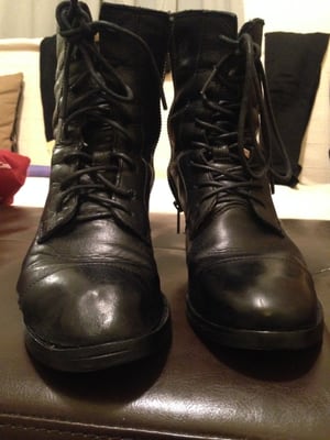 Botched franken-boot. Note the lack of symmetry between the left boot (the one "re-soled") and the right.