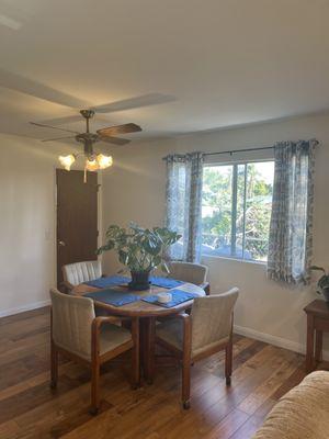 Finished dining room with new ceiling and flooring