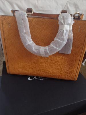 Brand new coach bag in it's original package