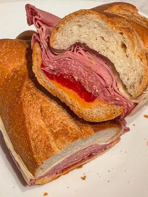 12. Italian Hero-Cappo Sandwich. Soppresatta, mortadella, salami, provolone, & roasted red peppers.  $14.95 + tax + tip