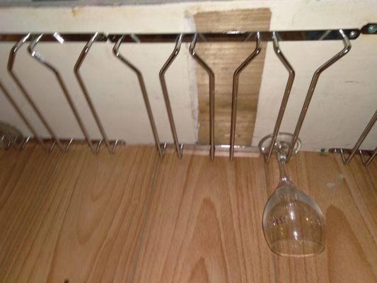 This is a Wine rack installed under a cabinet.