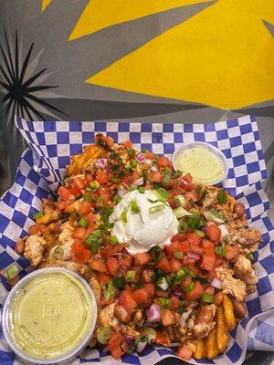 Loaded Waffle Fries W/ Two Sides Of Creamy Avocado Dressing!