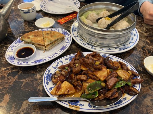 Scallion pancake Crab meat and pork soup dumplings Beef with mushroom and bamboo shoots