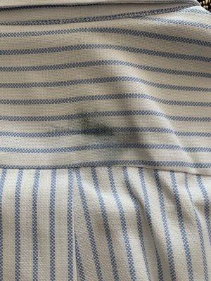 Another black spot on shirt