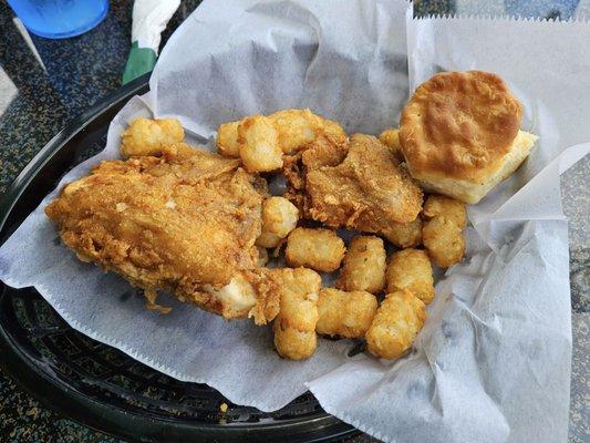 2 piece fried chicken with side of tator tots.