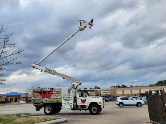 Our bucket truck with the new wrap. 'Merica!