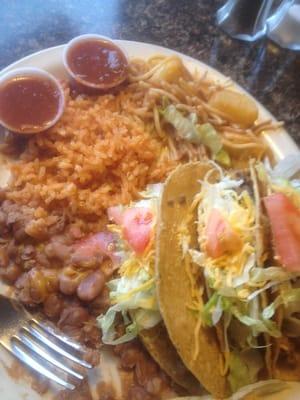 Tacos, beans and rice.   Portions are generous and inexpensive.