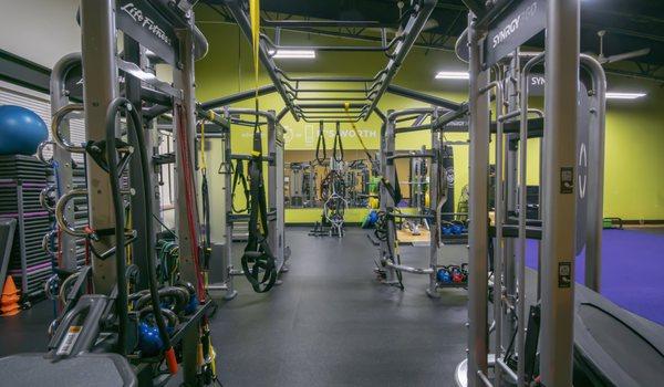 Huge functional training area complete with 5 full racks and platforms, turf and all accessories!