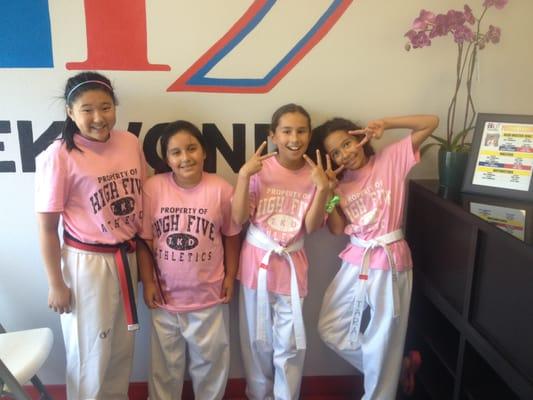 Our lovely students in our pink Hi 5 TKD T-shirts.