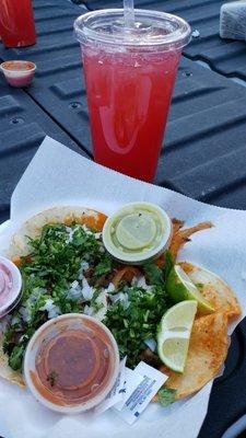 Tacos carne asada y watermelon drink.