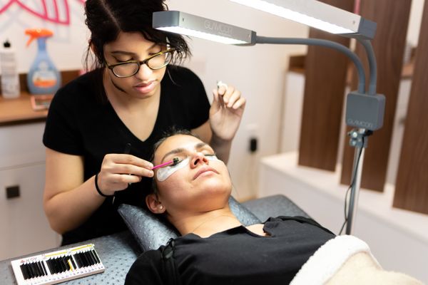 Eyelash Experts in Action. We have varying lengths, thicknesses and curls to give your eyes a custom look