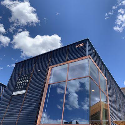 Exterior reflecting clouds and cobalt blue sky