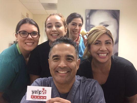 Dr. Castro and the Smileneeds staff