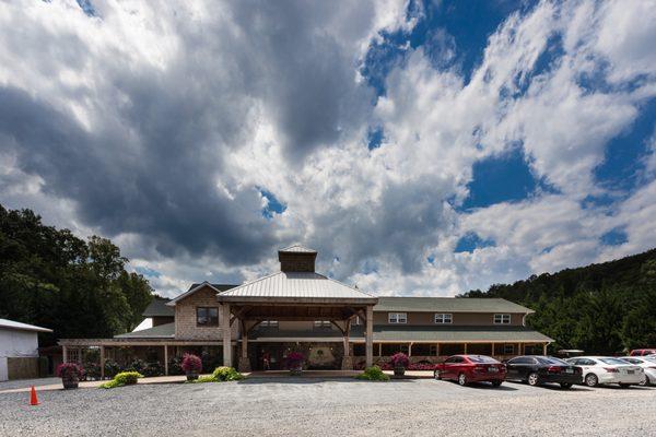 The main building that includes the "Glass Room" and a great patio for outdoor eating / dancing.