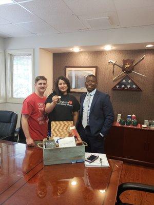 Closing on our first home with my husband and our agent, Mr. Donavan McFadden!