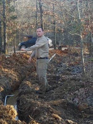 Not a broke water line,it had been wet prior to this project and water just poured into ditch,no effect on project wellness,My Son Helping