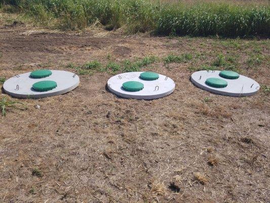 New lids for conventional septic systems.