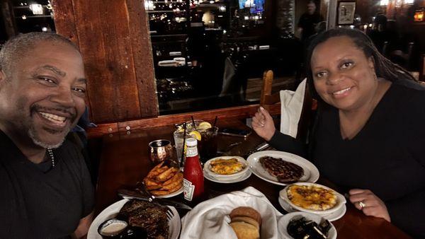 Blackened Prime Rib with house-made horseradish sauce, Delmonico Ribeye, Loaded Red-skinned garlic potatoes, and steak fries. ,